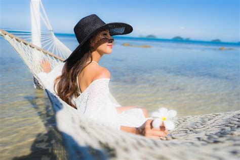 Free Photo Portrait Beautiful Young Asian Woman Sitting On Hammock