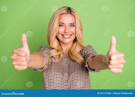 Photo Of Pretty Satisfied Person Show Two Arms Thumbs Up Beaming Smile