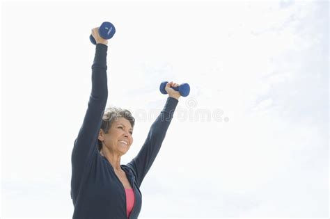Woman Exercising With Dumbbells Stock Image Image Of Pensioner