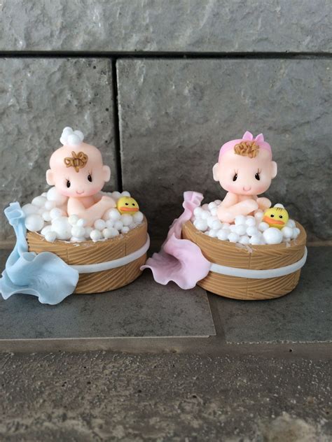 The soothing baby bath is enhanced with relaxing natural calm aromas and cleanses baby's skin, leaving it feeling touchably soft and smooth. Baby taking a bath favor size | Cake toppers