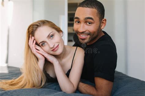 Portrait Cute Lovely Couple In Love Chilling Smiling To Camera On Bed