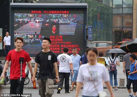 Chinas Facial Recognition System Punishes Jaywalkers By Putting Their