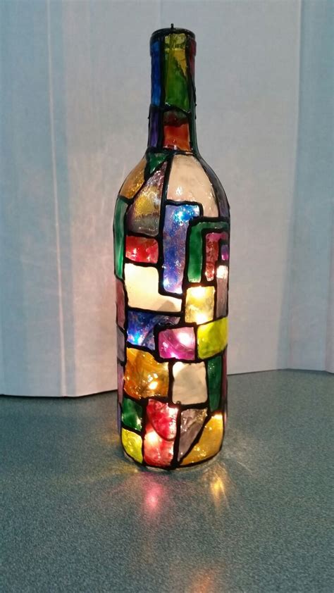 Stained Glass Look With Lights Glass Bottle Crafts Painted Wine Bottles Wine Bottle Crafts