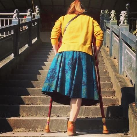 Amputee Polio Paraplegic Models — Amputee Woman Walks In Wooden Crutches