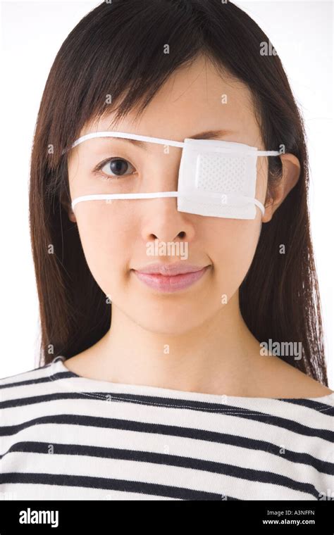 A Woman Wearing Eye Patch Stock Photo Royalty Free Image