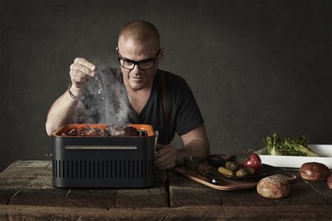 On this year's 'ultimate gift guide for him' is heston blumenthal's £799 bbq, a £150 leather bar tool set and £45 biscuits shaped like cars. Everdure CUBE by Heston Stone houtskool BBQ - Martijn van Roon