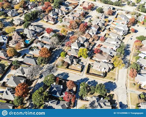 Top View Residential Neighborhood In Suburban Dallas With Bright Autumn