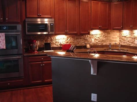 In my house flip it was cursed with a very dated and ugly kitchen. DIY Stone Backsplash with AirStone - Stilettos & Diapers