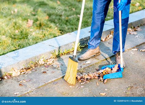 Sweeping Leaves With Broom And Scoop Stock Image Image Of Leaves