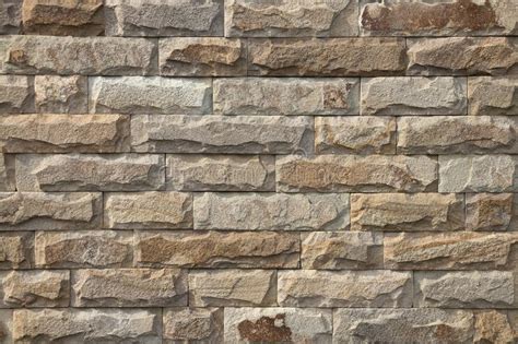 Beige Brick Wall Made Of Natural Stone Stock Photo Image Of