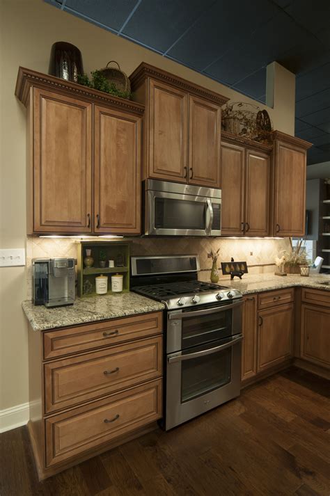We do about 1500 kitchens per year serving all of ohio & beyond. Medium Wood Cabinets, Light Granite, Stainless Steel ...