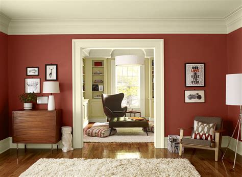 The dark browns and greens and the light blues and yellows. Applying the Harmony to Your Living Room Paintings - MidCityEast