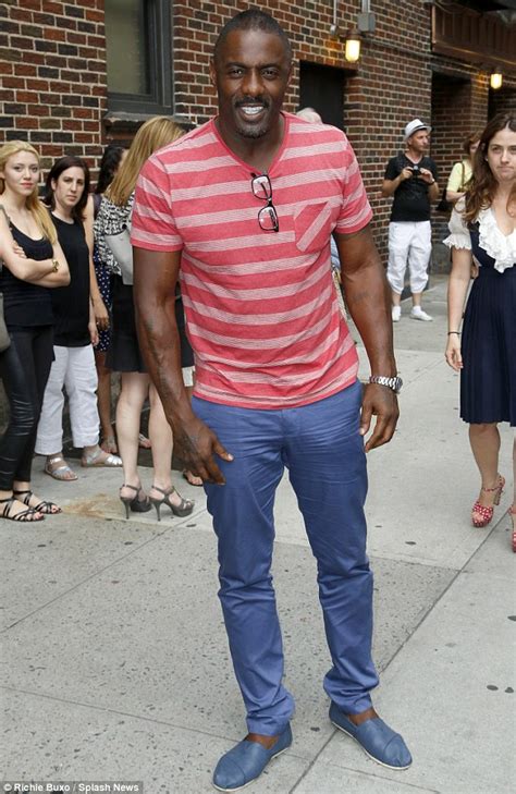 Idris Elba Dons Pink Striped Shirt And Blue Trousers As He Promotes