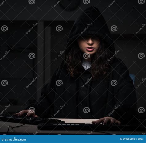 Female Hacker Hacking Security Firewall Late In Office Stock Photo