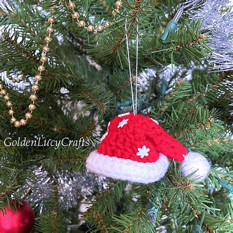 Ravelry Mini Santa Hat Ornament Pattern By Goldenlucycrafts