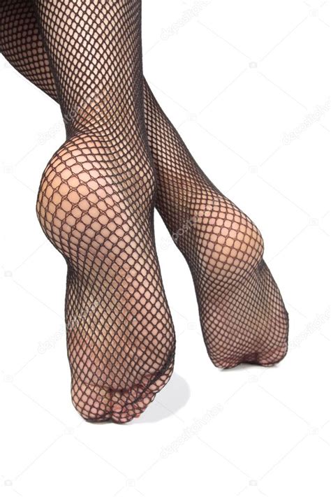 Woman Feet With Fishnet Tights Over White Background Stock Photo By Strobos