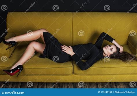 Beautiful Model In Black Dress Laying On Sofa Stock Image Image Of Beauty Body