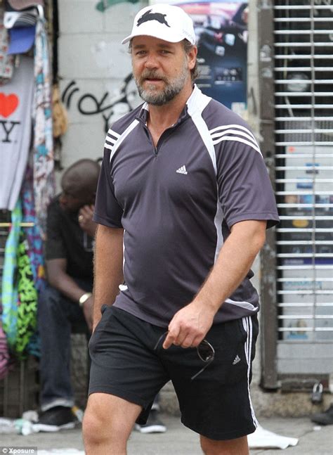 Russell Crowe Battles The Middle Age Spread As He Pounds The Pavements Sporting Scruffy Grey