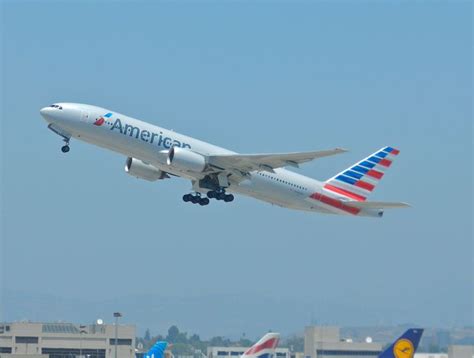 An American Airlines Jet Taking Off From The Airport