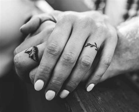 Top 59 Best Wedding Ring Tattoo Ideas 2021 Inspiration Guide