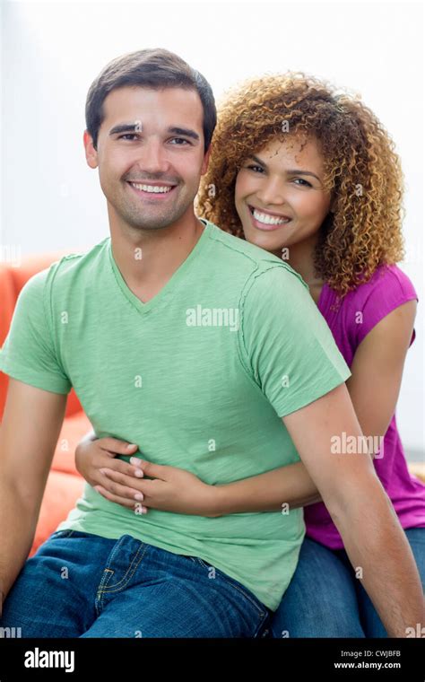 Mixed Race Couple Hugging Stock Photo Alamy