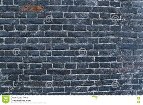 Texture Of A Black Burnt Brick Wall Covered With Soot Stock Photo