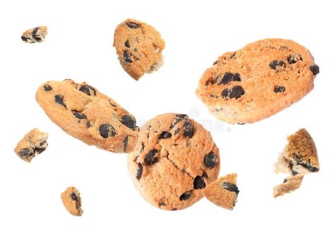 Delicious Chocolate Chip Cookies Falling On White Background Stock