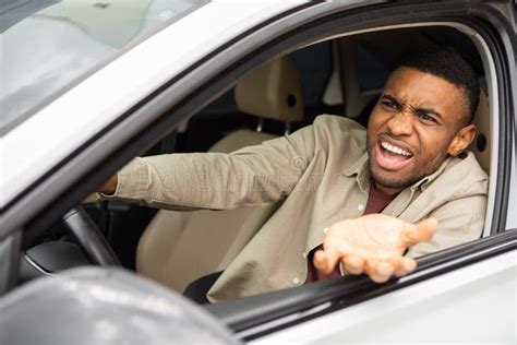 Side View Of An Angry Black Man Driving A Car Stock Image Image Of