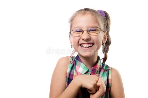 Little Cute Girl In Glasses Posing On A White Background Stock Photo