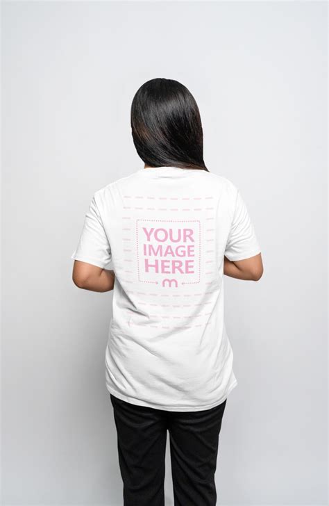 Back Side Mockup Of A T Shirt Worn By A Woman Mediamodifier