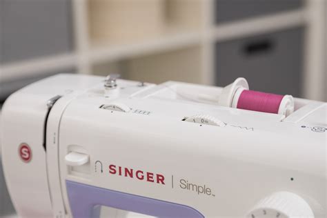 Singer Simple 3232 Portable Sewing Machine With 32 Built In Stitches