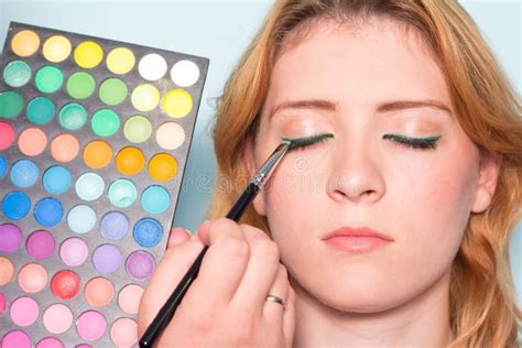 Makeup Artist Paints A Eyes Of Woman Makeup Stock Photo Image Of