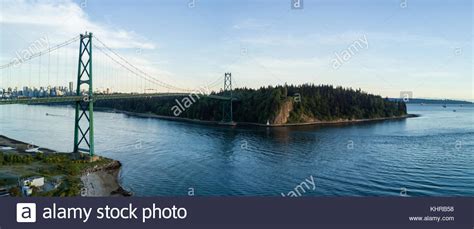 Aerial Panoramic View Of Lions Gate Bridge Stanley Park And Downtown