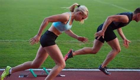 Athlete Woman Group Running On Athletics Race Track 12652397 Stock