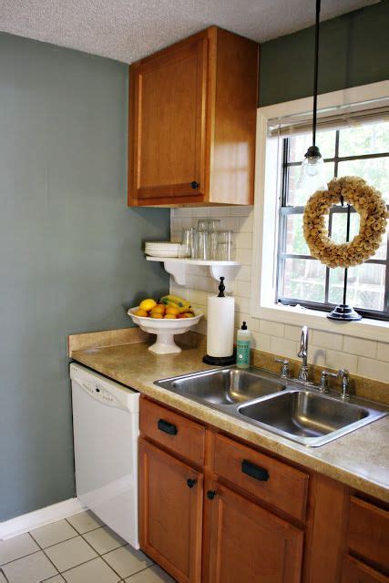 Here is a picture of the kitchen with steamed milk on the walls. I love blue wall paint against oak cabinets...(if you're ...