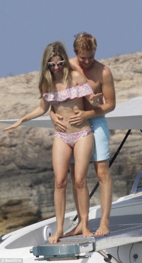 Nico Rosberg Packs On The Pda With His Stunning Bikini Clad Wife Vivian In Spain Daily Mail Online