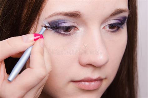 Sad Girl Makeup Artist Draws Arrows Stock Image Image Of Eyelids