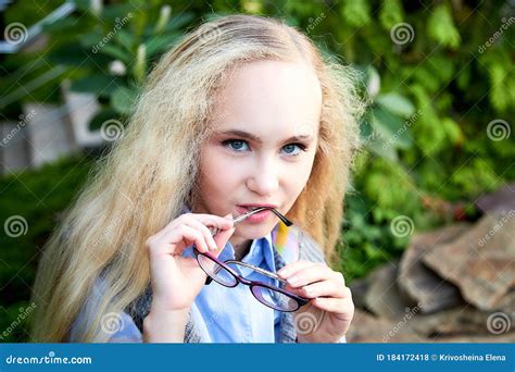 Pretty Teenage Girl 14 16 Year Old With Curly Long Blonde Hair And In