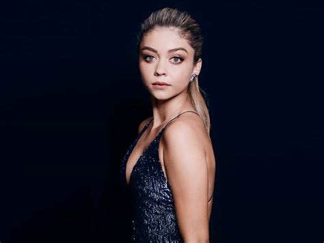 Download Sarah Hyland Posing In A Stylish Outfit Wallpaper