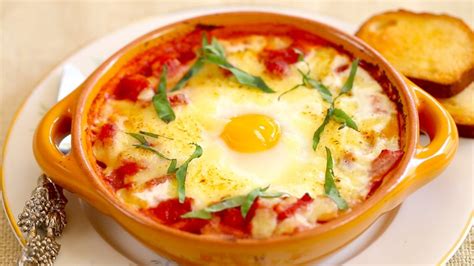 Cream in each dish, starting over the yolks and working around the dish. Italian Baked Eggs - Gemma's Bigger Bolder Baking