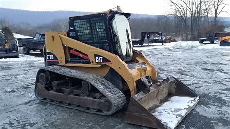 Picked up a new cat skid loader and we finished gas landscaping hq! 2005 Cat 277B Skid steer loader - YouTube