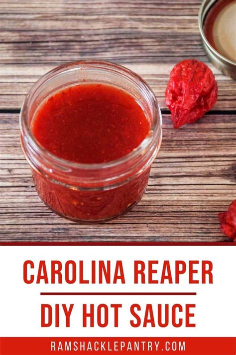 Homemade Carolina Reaper Diy Hot Sauce In A Glass Jar On A Wooden Table