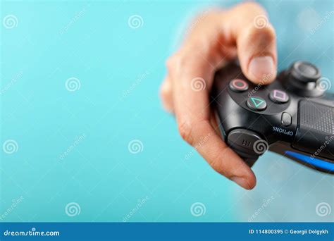 Male Hands Holding A Ps4 Controller Editorial Image Image Of Game