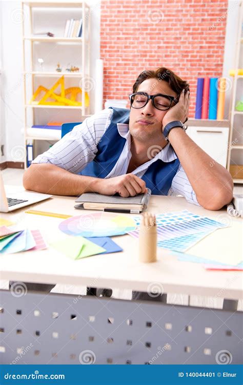 The Young Designer Freelancer Working On New Project Stock Image