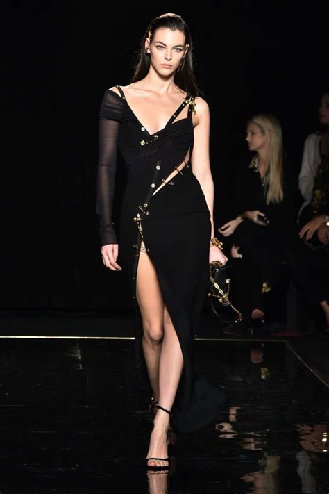 Elizabeth Hurleys Versace Safety Pin Dress Gets A Modern Update Wwd