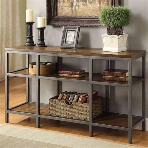 From headboards to bar stools, metal (especially matte black or polished dark gray metal) is the. Charmingly designed with an industrial style in mind, this sofa table is a great addition to any ...