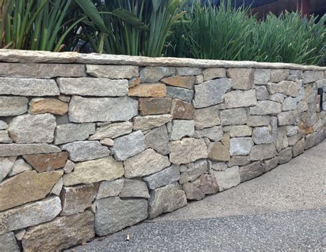 Loose Stone Wall Cladding | Stone veneer wall, Landscape lighting ...