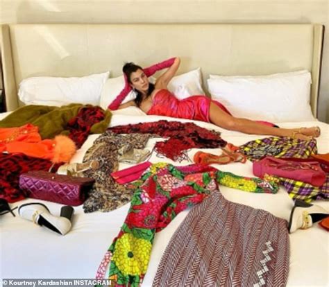 Kourtney Kardashian Luxuriously Lounges On Her Bed In An Eighties