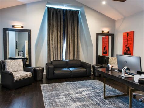 Rugs and textiles in warm tones also stand out against grey walls, as. Light gray walls contrast the dark wood floor in this ...