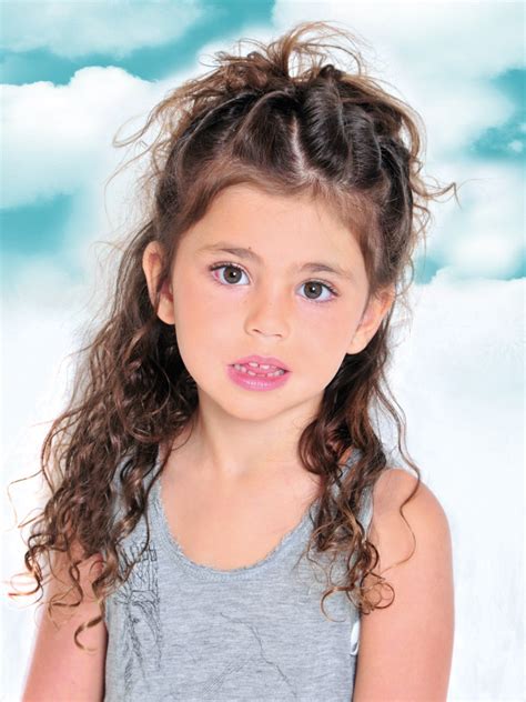 The topic of hairstyles for kids is particularly interesting to every mom who has been blessed with a daughter. Girls long hairstyle with twists and tousles
